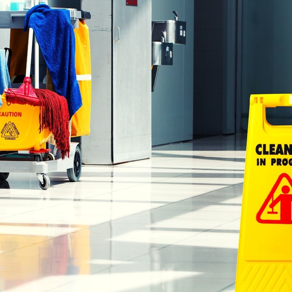 Safety cleaning. Девушка уборщица в офисе. Скользкий пол. Health and safety executive. Safety cleaning.